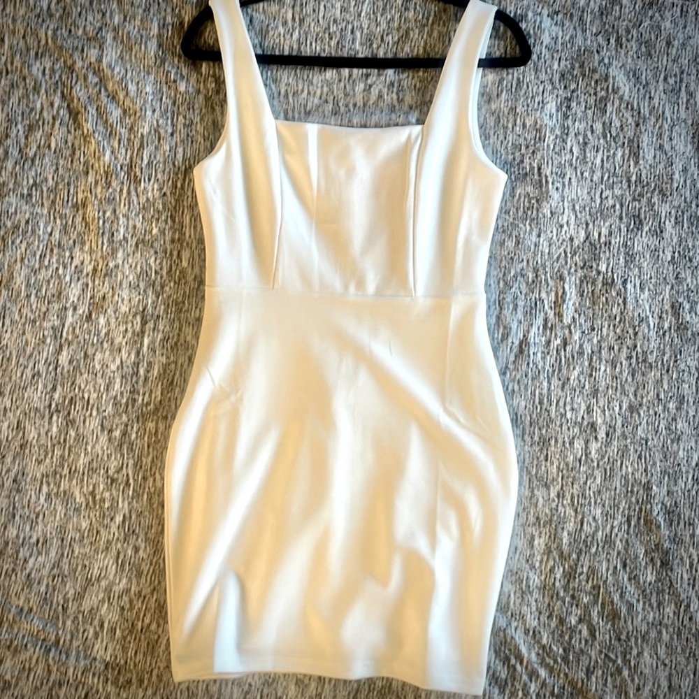 New, white, Pink Lily, medium size, dress. Short, form fitting, square neckline.